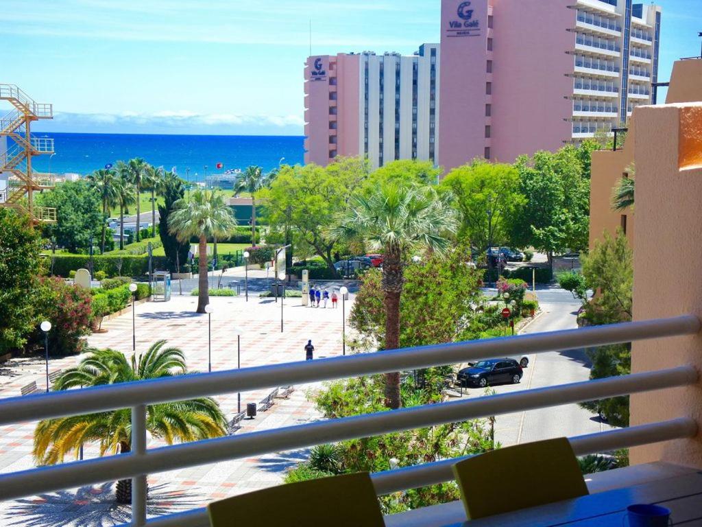 a balcony with a view of a parking lot at Seastar in Vilamoura