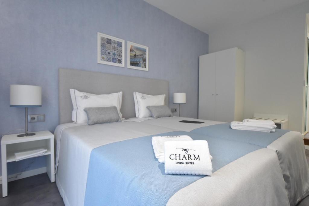 Postel nebo postele na pokoji v ubytování My Charm Lisbon Suites