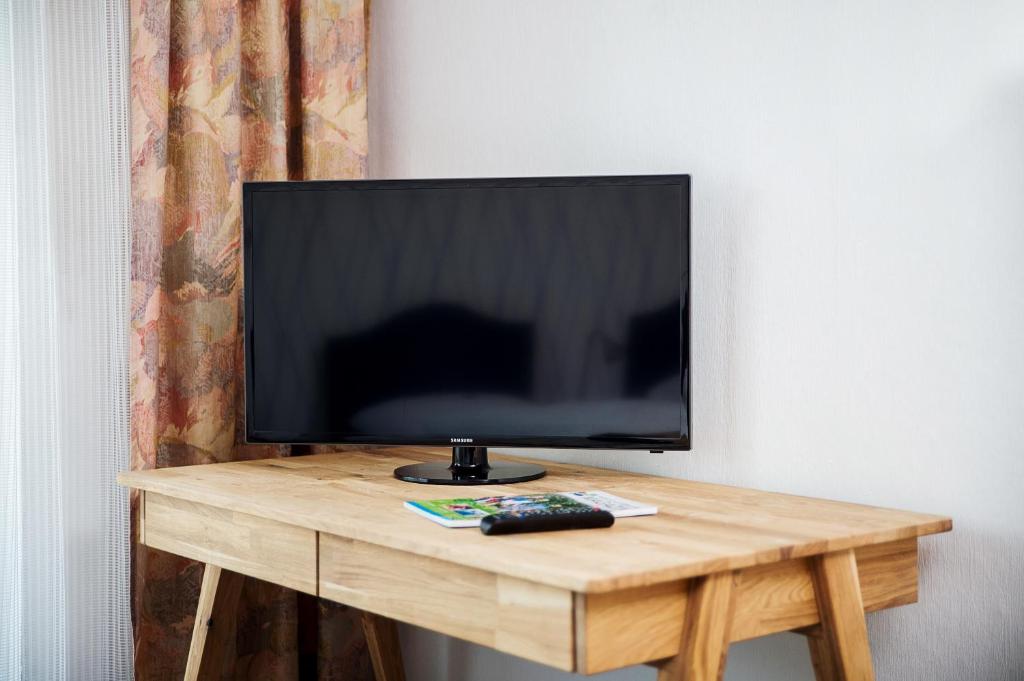 TV a/nebo společenská místnost v ubytování Hotel-Pension Seitz