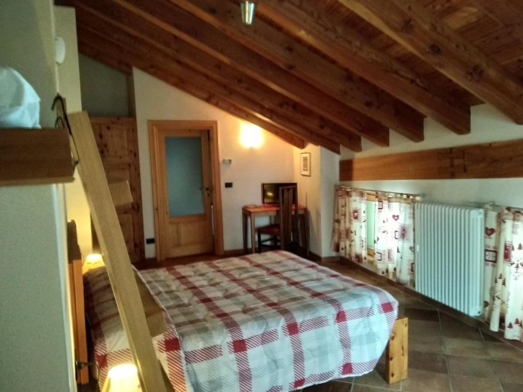 Posteľ alebo postele v izbe v ubytovaní Affittacamere I Picchi