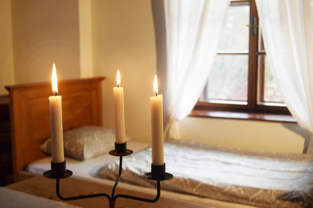 Postel nebo postele na pokoji v ubytování Bučický mlýn
