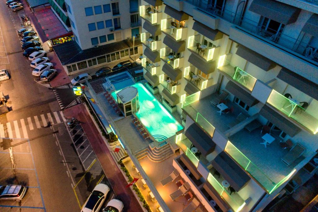 an overhead view of a building with a swimming pool at Hotel Residence Villa Jolanda in Lido di Camaiore