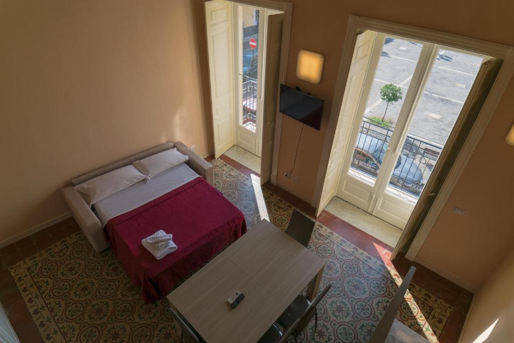 Postel nebo postele na pokoji v ubytování Badiula Flat