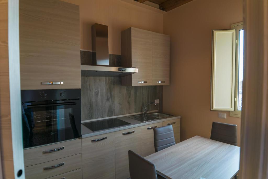 Kuchyň nebo kuchyňský kout v ubytování Badiula Flat