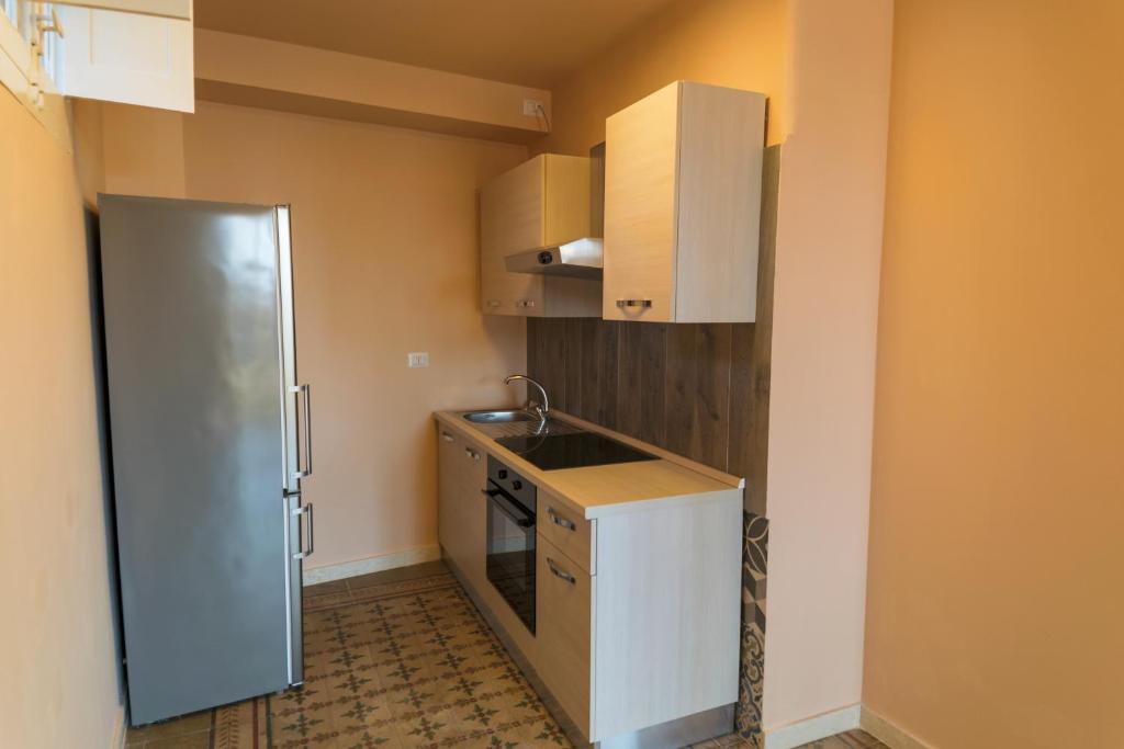 Kuchyň nebo kuchyňský kout v ubytování Badiula Flat