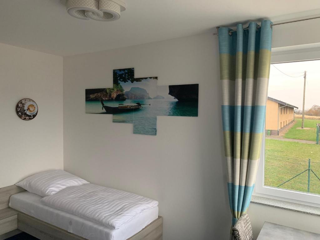 Postel nebo postele na pokoji v ubytování Hotel Am Spielacker