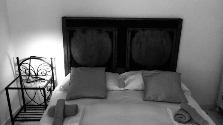Ein Bett oder Betten in einem Zimmer der Unterkunft Palazzo Morese Apartments