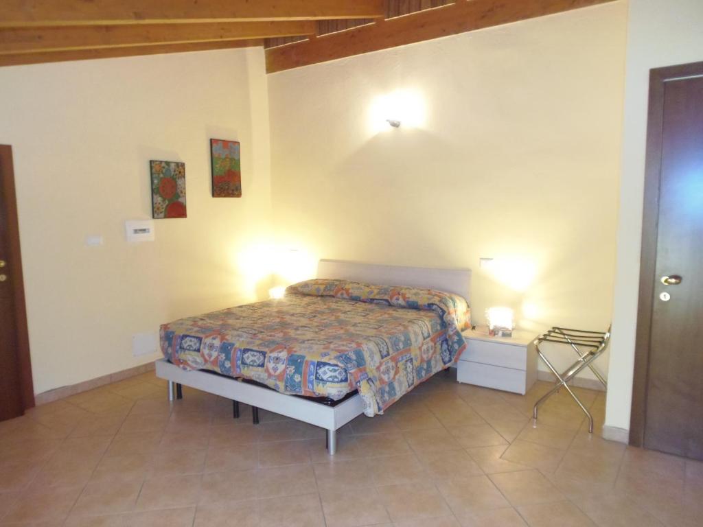 Postel nebo postele na pokoji v ubytování B & B AECOLIBRIUM