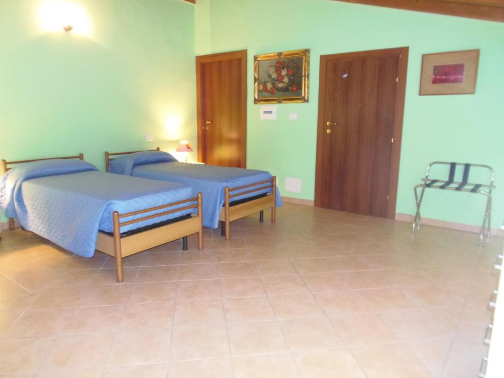Postel nebo postele na pokoji v ubytování B & B AECOLIBRIUM