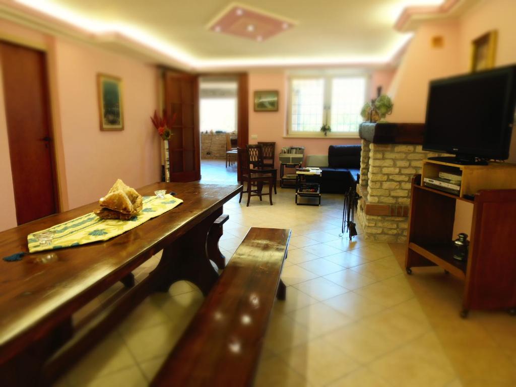 TV a/nebo společenská místnost v ubytování B & B AECOLIBRIUM