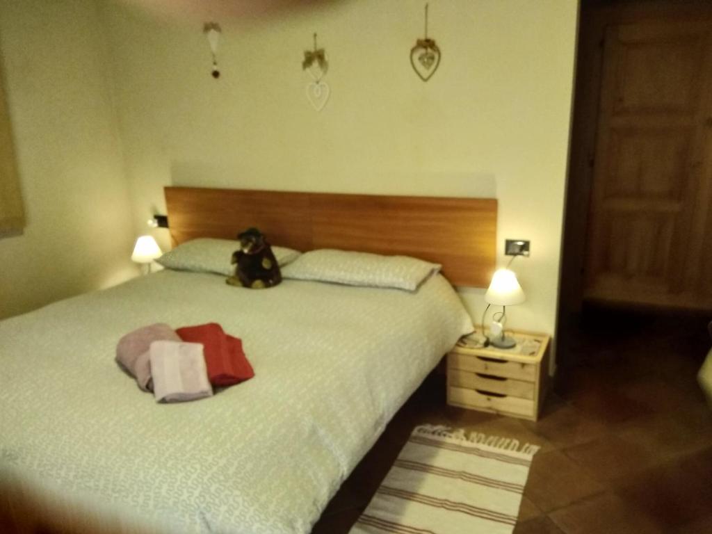 Posteľ alebo postele v izbe v ubytovaní Affittacamere I Picchi