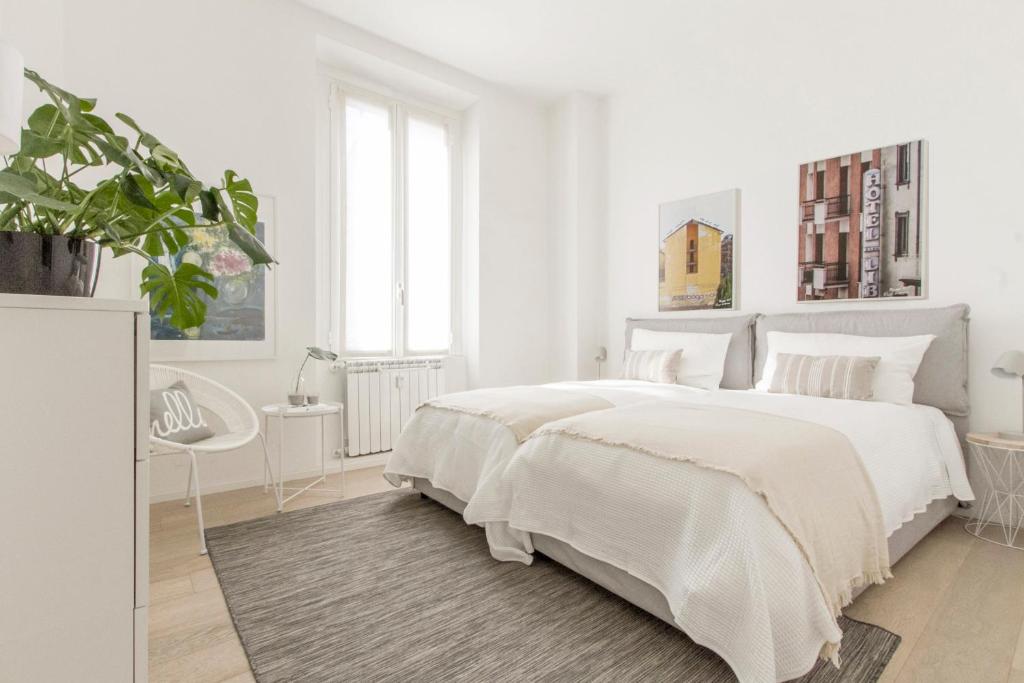 Posteľ alebo postele v izbe v ubytovaní Luxury and spacious apartment (Bocconi)