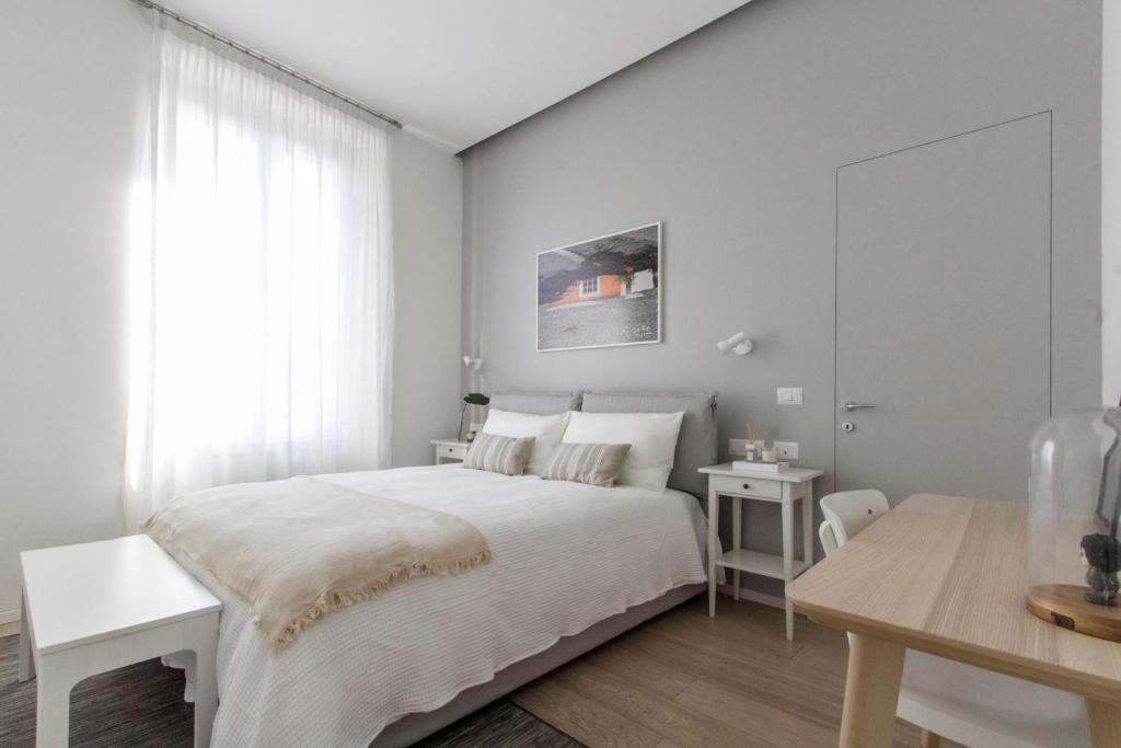 Posteľ alebo postele v izbe v ubytovaní Luxury and spacious apartment (Bocconi)