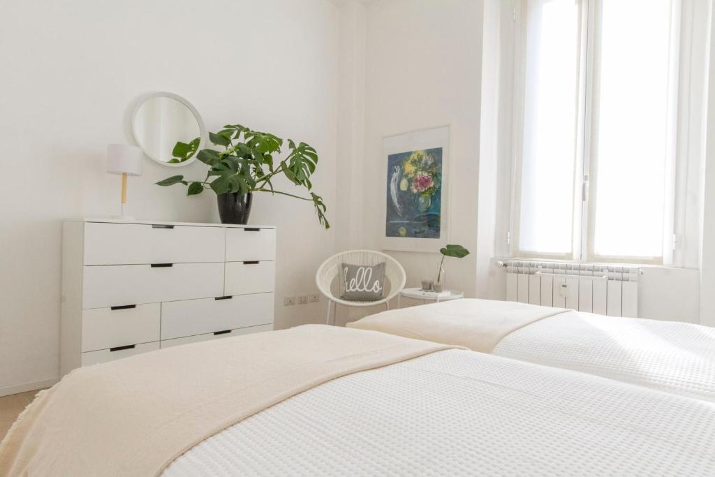 Posteľ alebo postele v izbe v ubytovaní Luxury and spacious apartment (Bocconi)