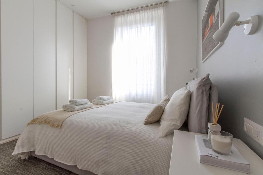 Posteľ alebo postele v izbe v ubytovaní Luxury and spacious apartment (Bocconi)
