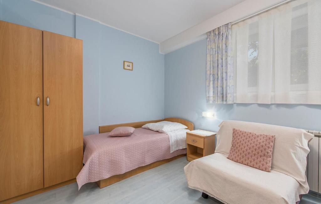 Postel nebo postele na pokoji v ubytování Apartment Complex Silvia