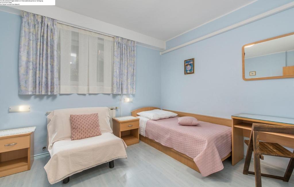 Postel nebo postele na pokoji v ubytování Apartment Complex Silvia