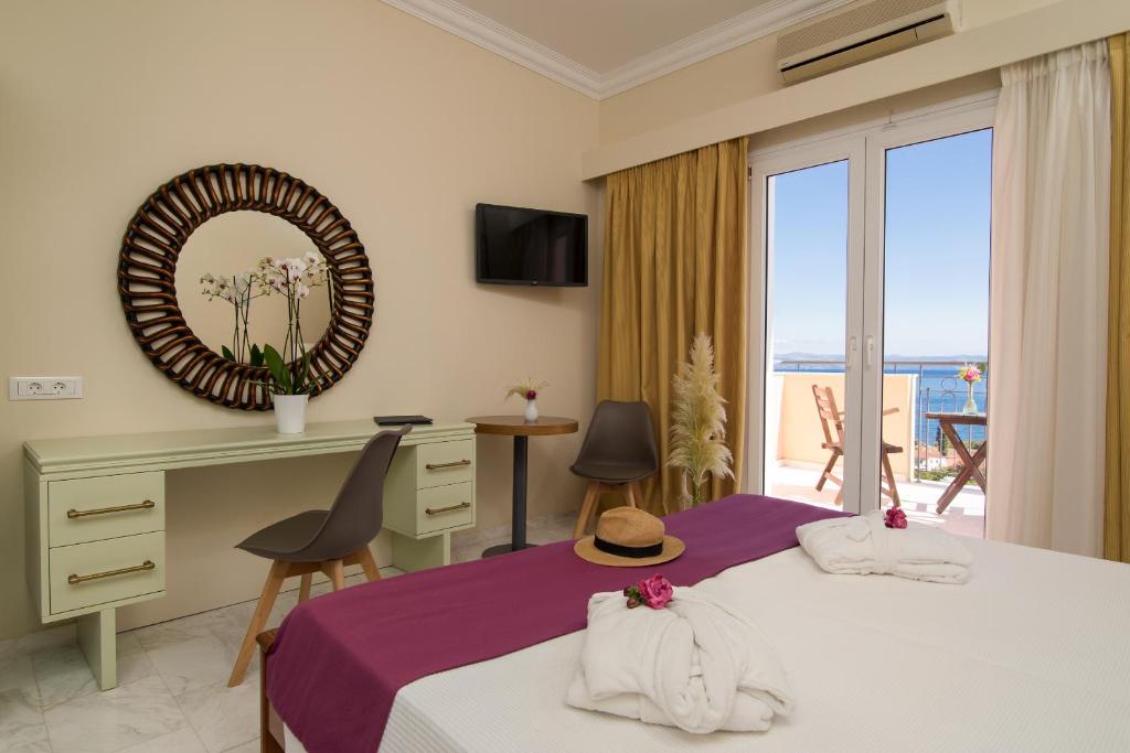Кровать или кровати в номере Sunrise Resort Hotel