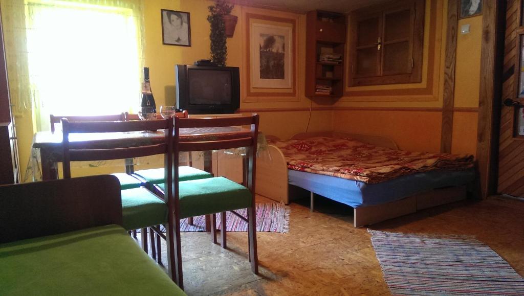 A television and/or entertainment centre at chata Ivka Leštiny