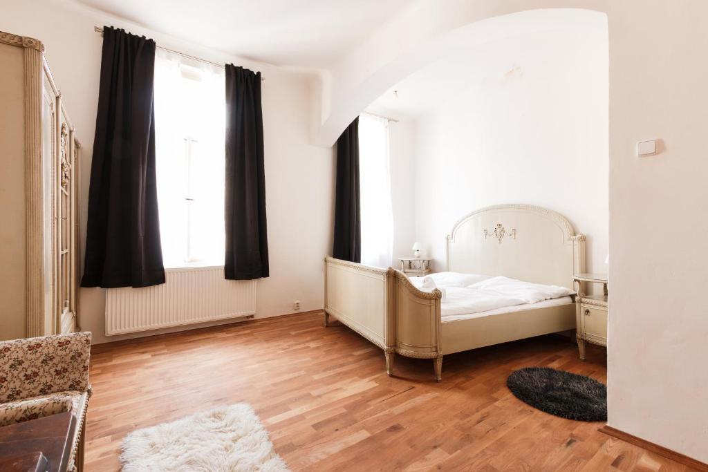 Postel nebo postele na pokoji v ubytování Stylish New Town Apartments