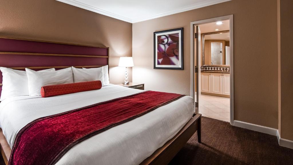 A standard king size bedroom at the Paris casino-hotel is seen on