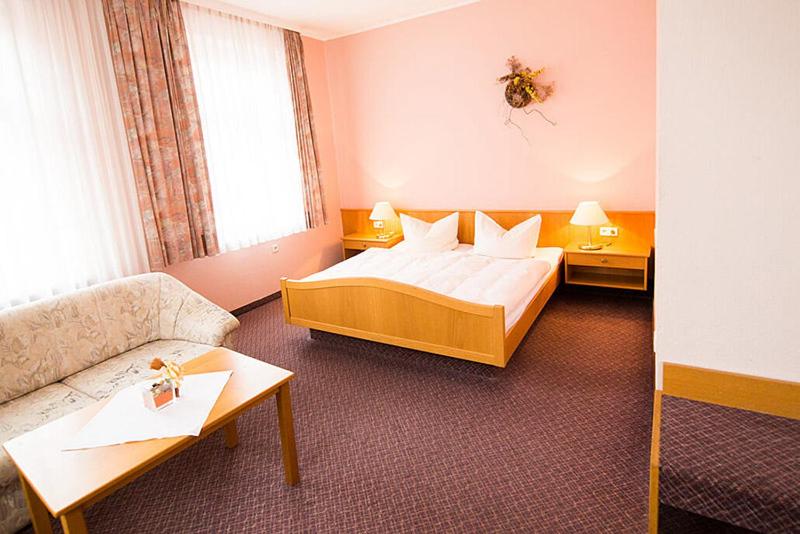 Postel nebo postele na pokoji v ubytování Hotel Goldenes Schiff