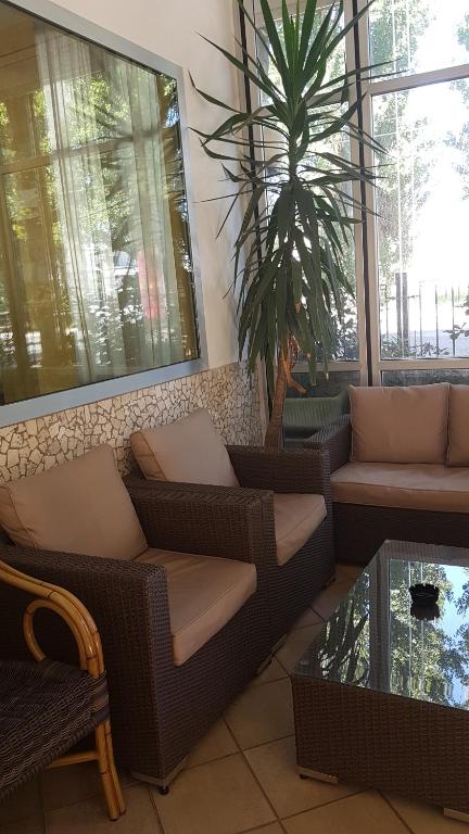 Posezení v ubytování Hotel De La Plage
