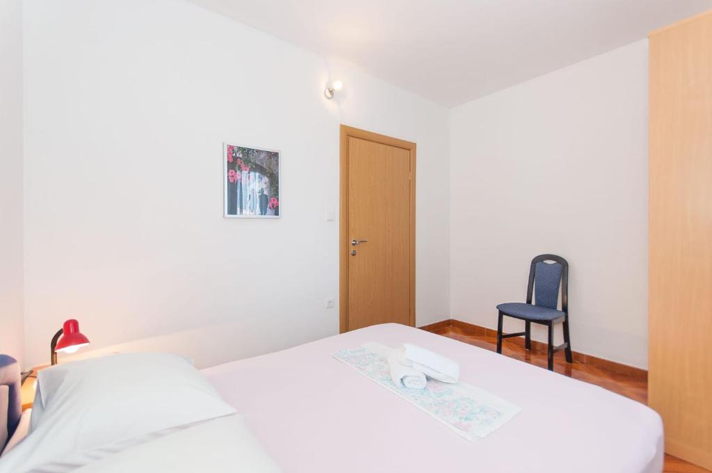 Posteľ alebo postele v izbe v ubytovaní Apartments Marija Pisak