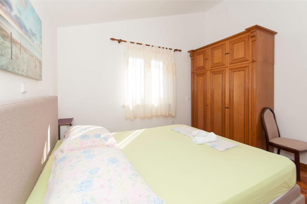 Posteľ alebo postele v izbe v ubytovaní Apartments Marija Pisak