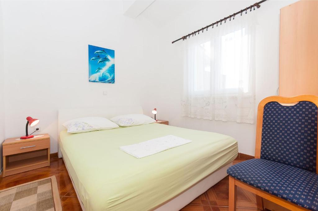 Posteľ alebo postele v izbe v ubytovaní Apartments Marija Pisak