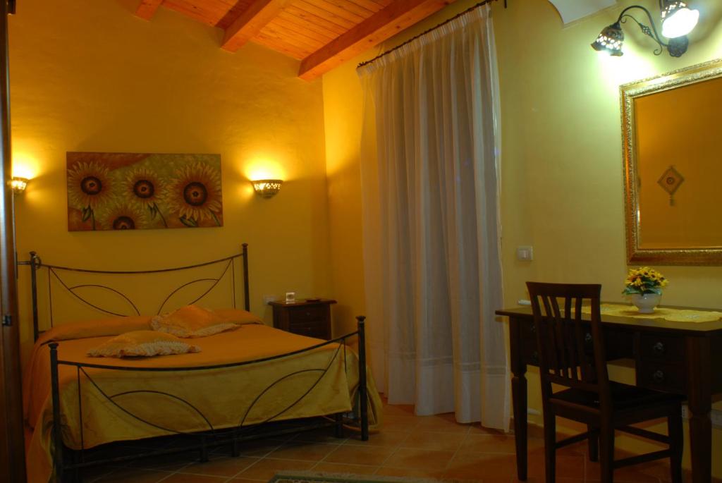 Postel nebo postele na pokoji v ubytování B&B Triskèles