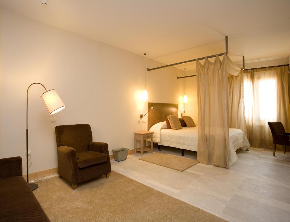 Posteľ alebo postele v izbe v ubytovaní Hotel La Vida Spa