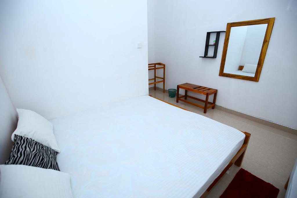 Postel nebo postele na pokoji v ubytování Amadi Rest