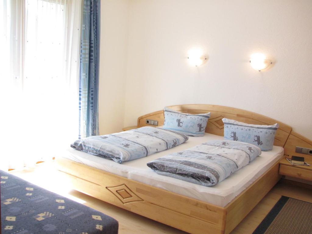 Postel nebo postele na pokoji v ubytování Landhaus Argus