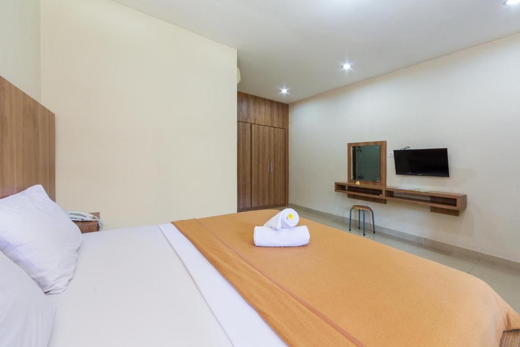 TV a/nebo společenská místnost v ubytování Simpang Inn Hotel