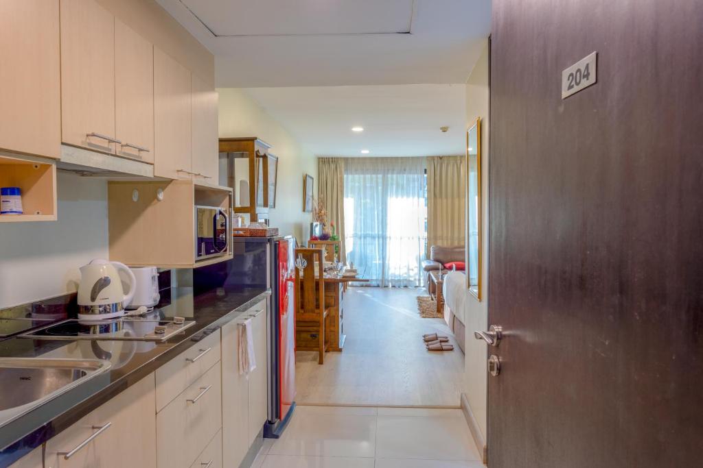Kuchyň nebo kuchyňský kout v ubytování Citismart Luxury Apartments