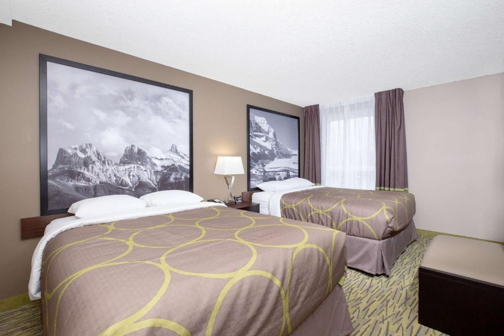 Voodi või voodid majutusasutuse Super 8 by Wyndham Canmore toas