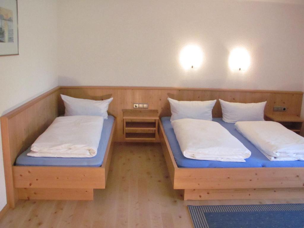 Postel nebo postele na pokoji v ubytování Landhaus Argus