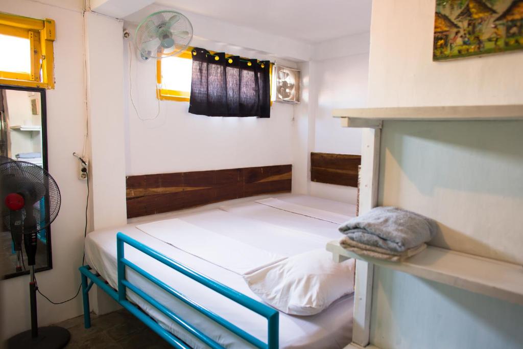 Postel nebo postele na pokoji v ubytování Gili La Boheme