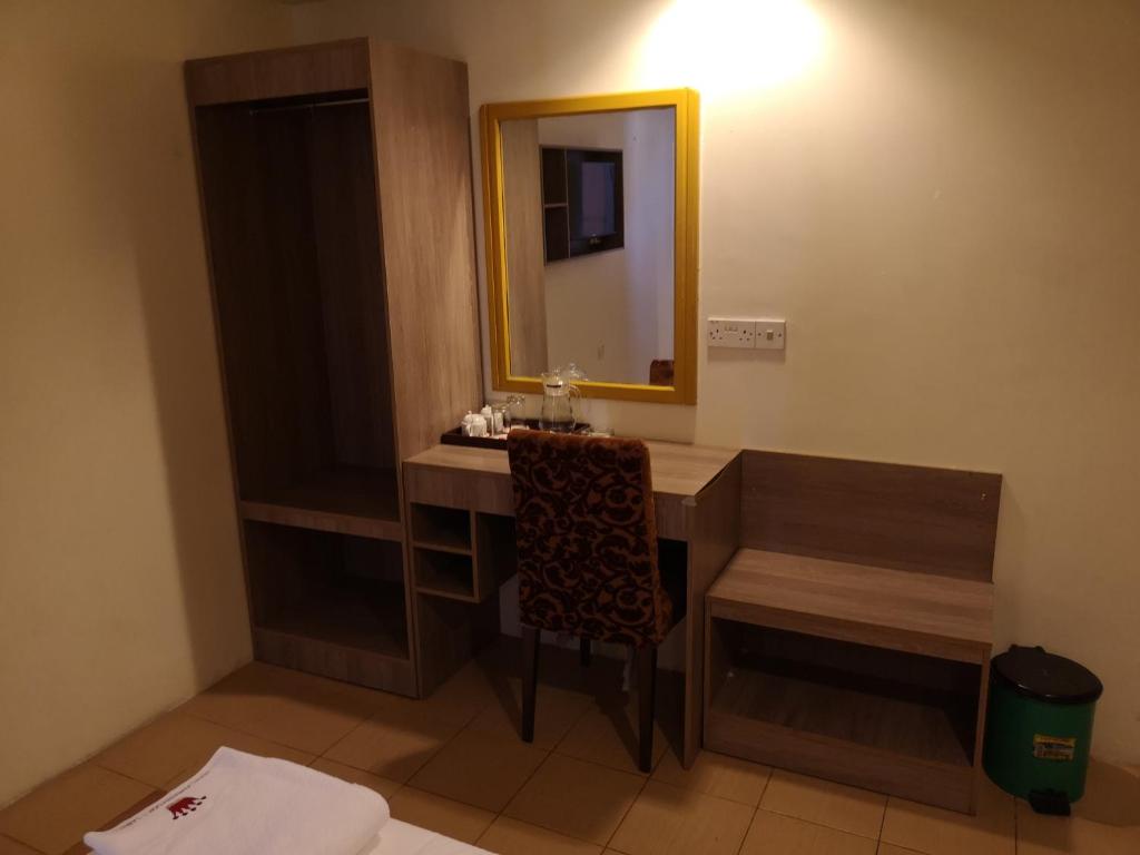 Postel nebo postele na pokoji v ubytování HOTEL AMBASSADOR 1