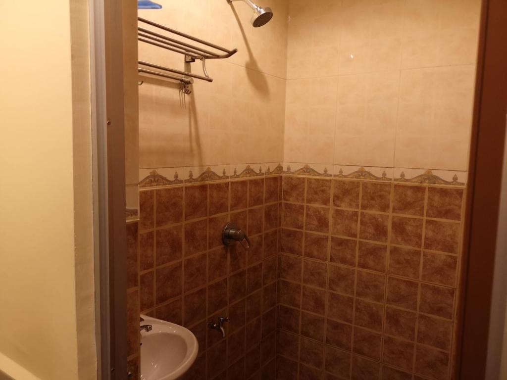 Koupelna v ubytování HOTEL AMBASSADOR 1