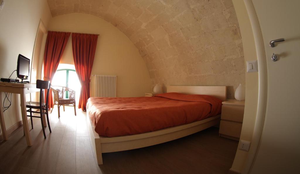Postel nebo postele na pokoji v ubytování Casa Natalì