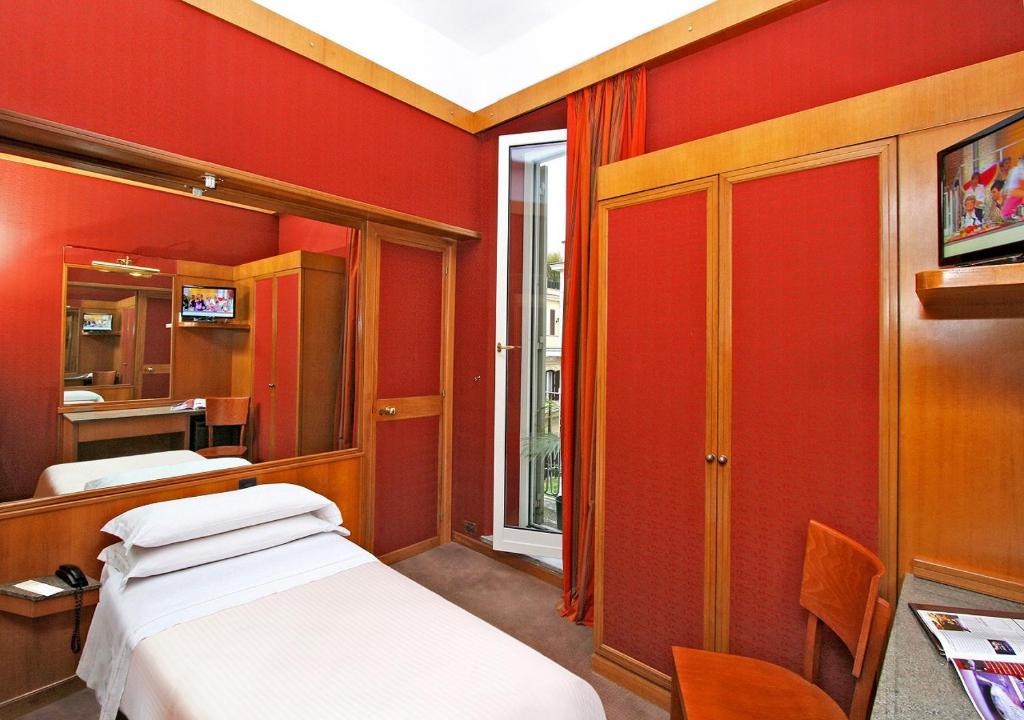 TV a/nebo společenská místnost v ubytování Hotel Arcangelo