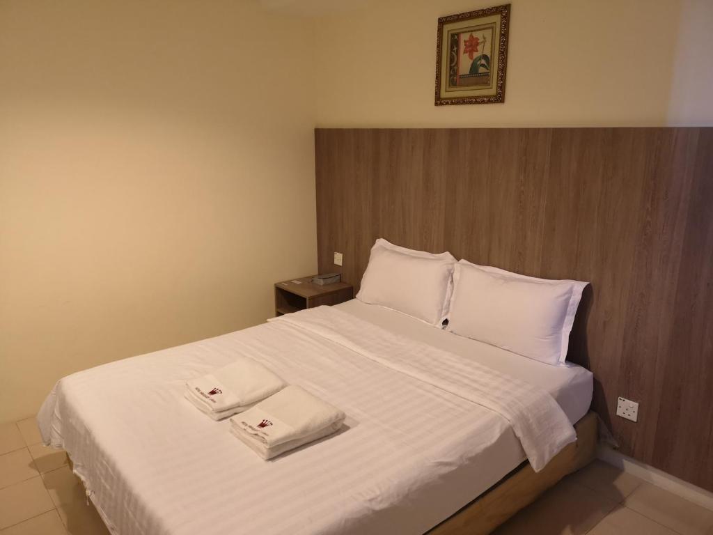 Postel nebo postele na pokoji v ubytování HOTEL AMBASSADOR 1