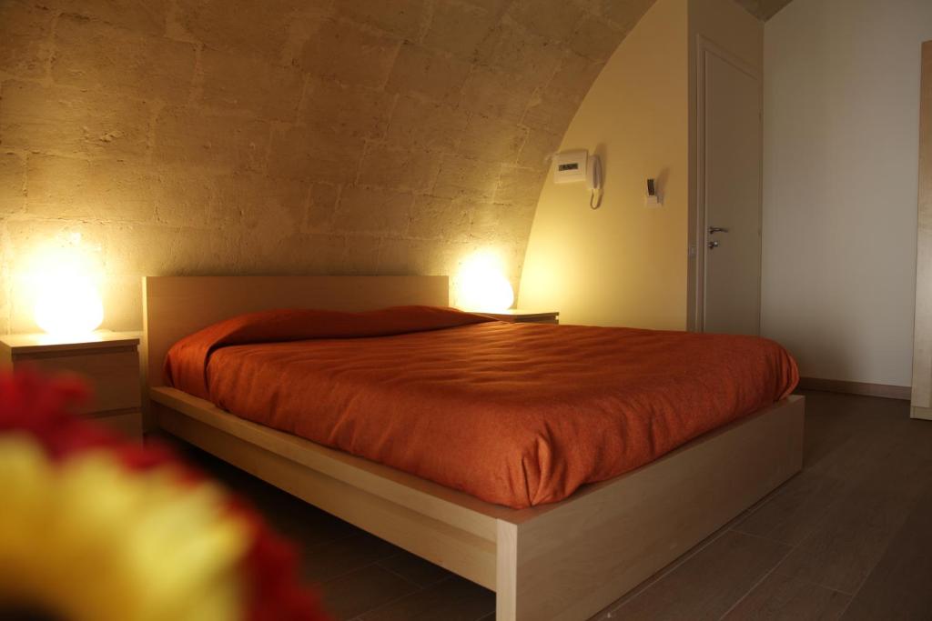Postel nebo postele na pokoji v ubytování Casa Natalì