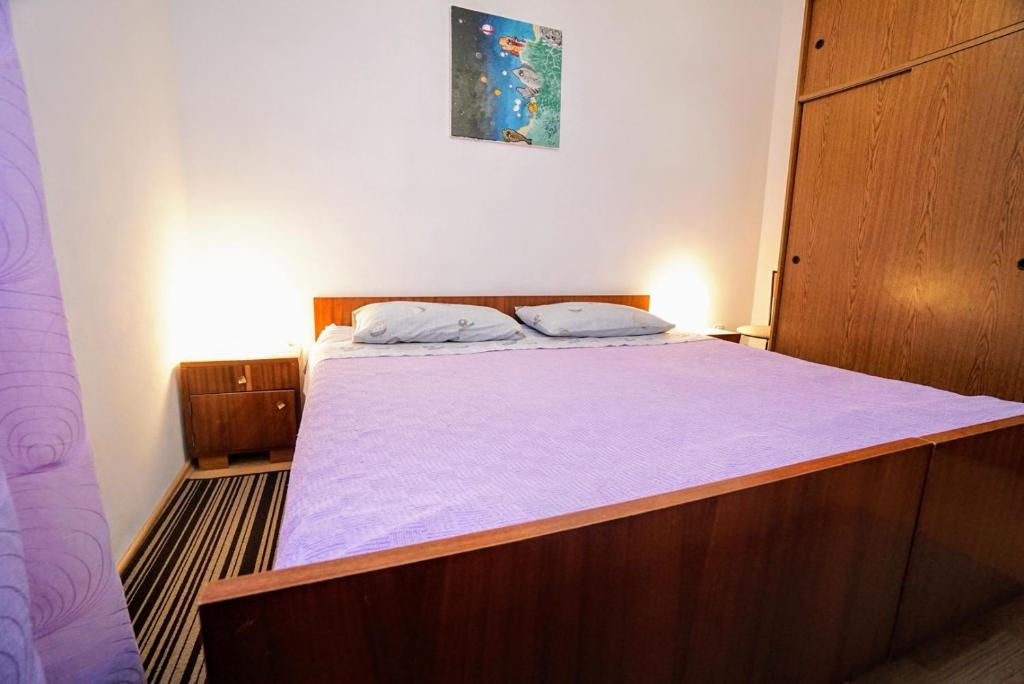 Postel nebo postele na pokoji v ubytování Apartment Cirila