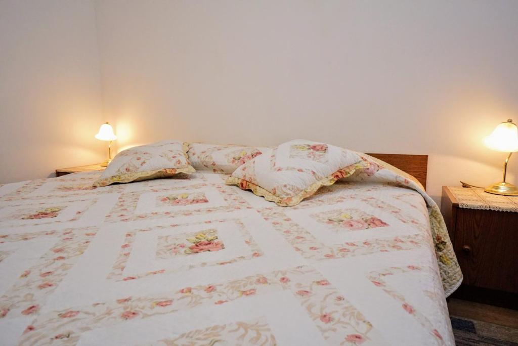 Postel nebo postele na pokoji v ubytování Apartment Cirila