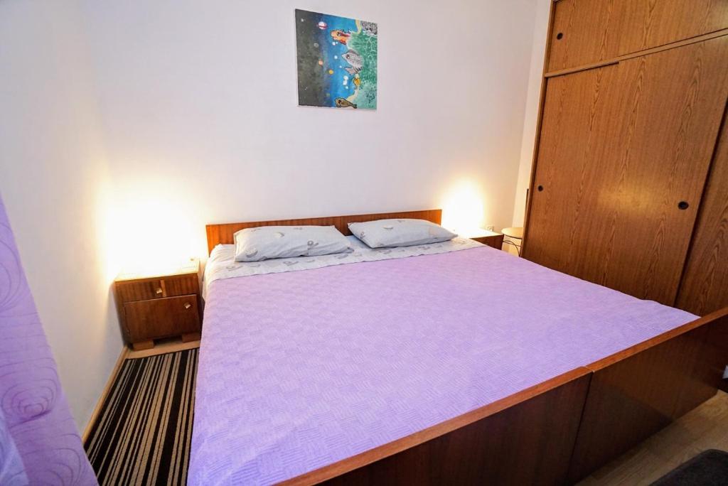 Postel nebo postele na pokoji v ubytování Apartment Cirila