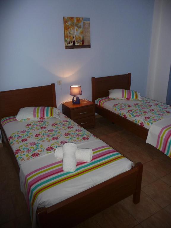 Postel nebo postele na pokoji v ubytování House Evristhenis 1