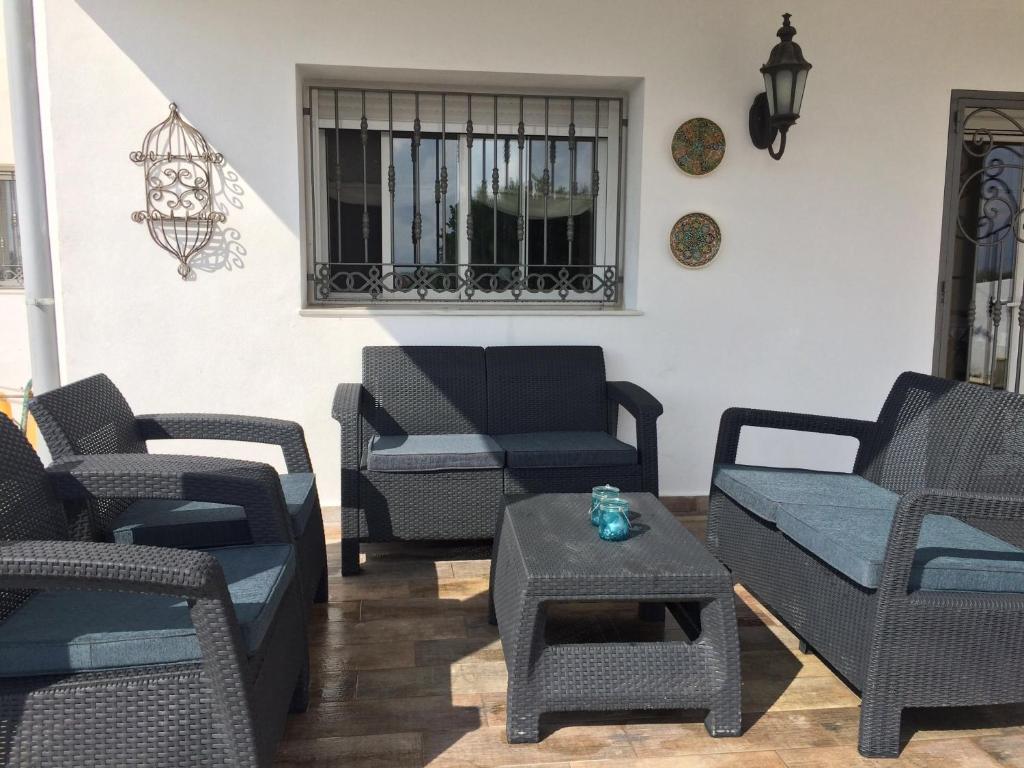 Posezení v ubytování Maison Al Riad